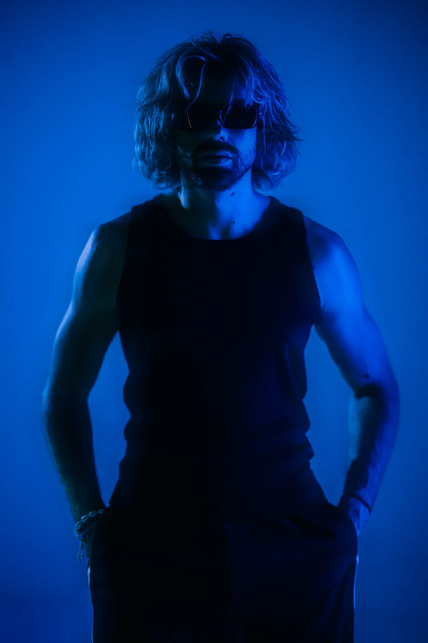Close portrait of Goldcher in blue light
